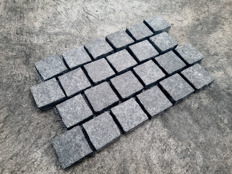 Black Flamed Granite Cobbles on Mesh (Brick Lay) – 600 x 390 x 30mm