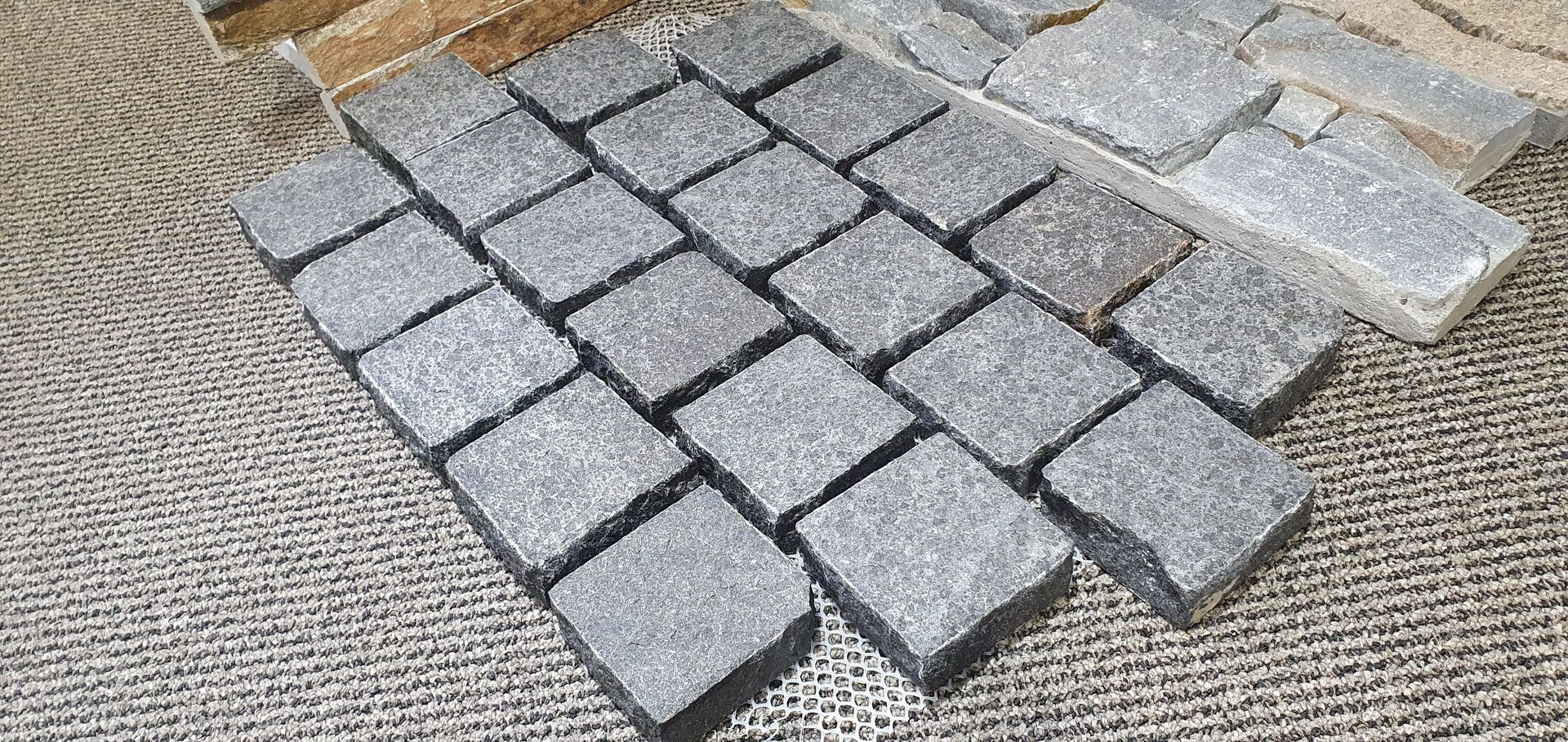 Black flamed granite cobbles on mesh 600 x 390 x 30
