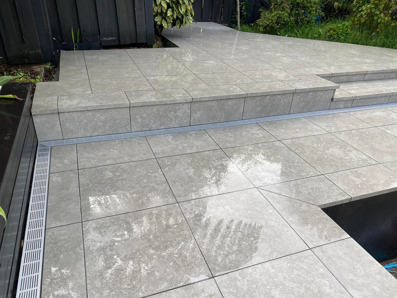 Tiled terrace and step, with corner